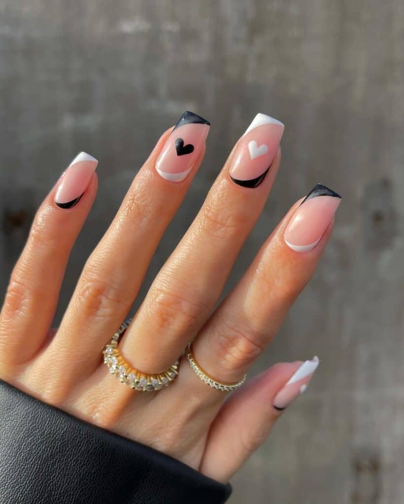 Short Monochrome black and white Valentine’s Nails with baby hearts in the middle